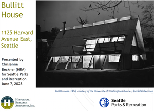 An A Frame house at night with all the windows illuminated on a document that says Bullitt House.