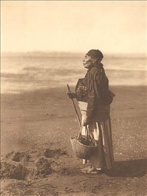 Chinook woman on beach, 1910