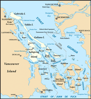 Map extending from Vancouver Island on left to Washington and British Columbia mainland on right, with Gulf and San Juan islands in channels between them and line showing international boundary running through the islands