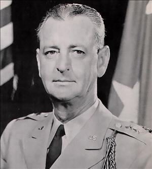 Head and shoulders portrait of a white man in military uniform