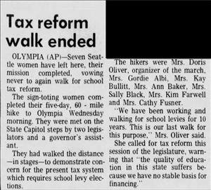 Newspaper headline says tax reform walk ended and describes a protest walk to Olympia for better school funding. 