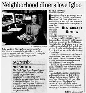 Newspaper clipping shows a smiling server holding a plate with a burger and fries on it. There are diner tables behind them and a headline that says Neighborhood Diners Love Igloo