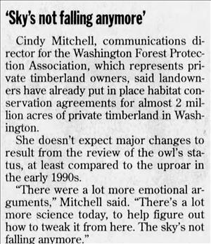 Newspaper clipping quotes Cindy Mitchell as saying the sky is not falling anymore. The article is about updated reviews to the spotted owl legislation. 