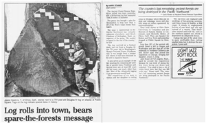 Newspaper clipping shows a child standing on a truck bed touching a giant log that has little signs pinned to its rings