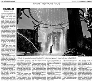 Newspaper clipping about the Rotary Fountain include an image of a person walking through a shower of water beneath a circular outdoor sculpture.