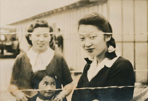 Women and child in Japanese internment camp during World War II