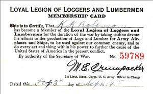 A paper card that says Loyal Legion of Loggers and Lumbermen membership card. A date and signature are handwritten at the bottom. 